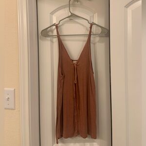 LIKE NEW. Burnt orange free people tank top. Size S.